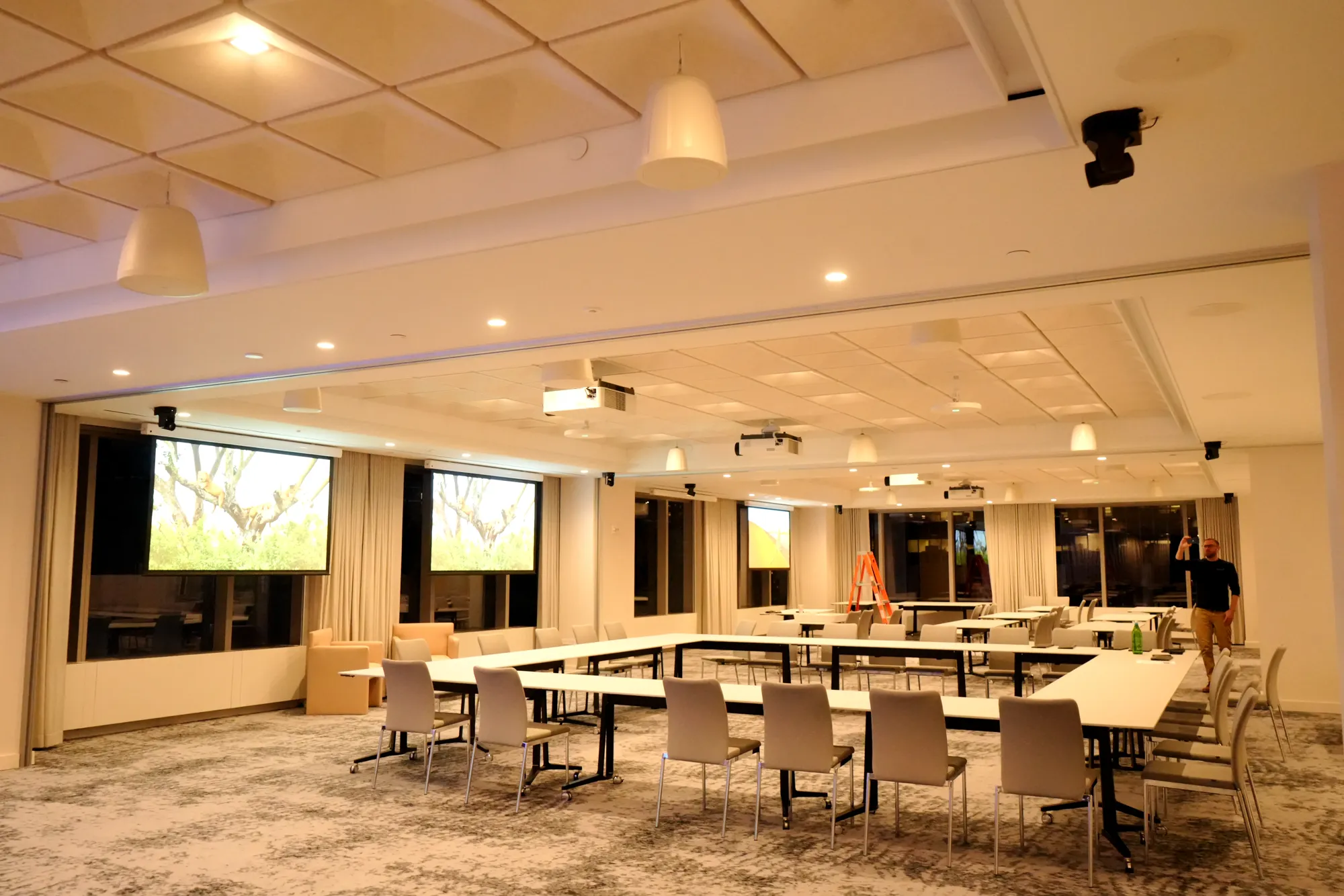 Training room with projection screens at 3 Times Square