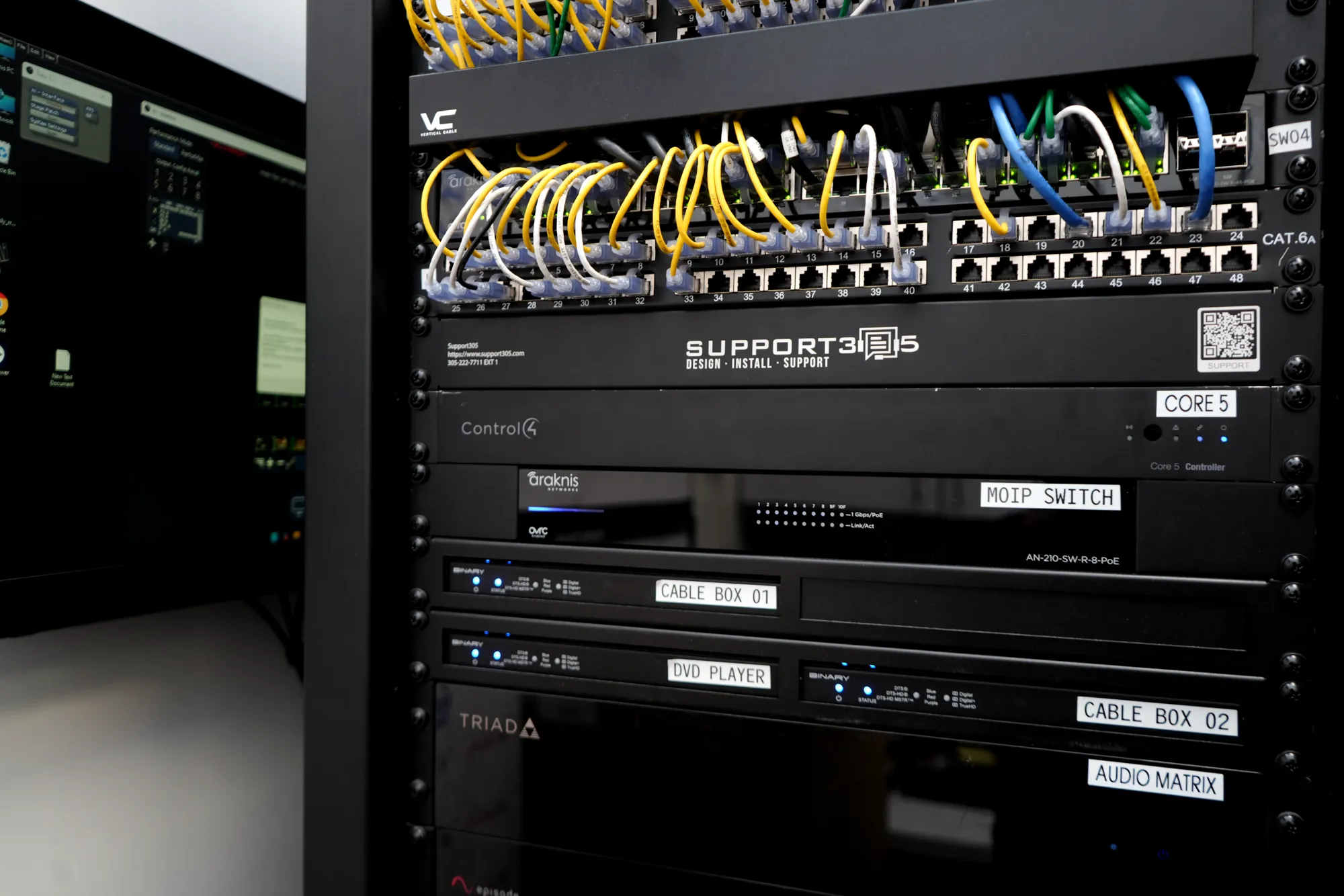 Labeled control and AV rack built by DIST