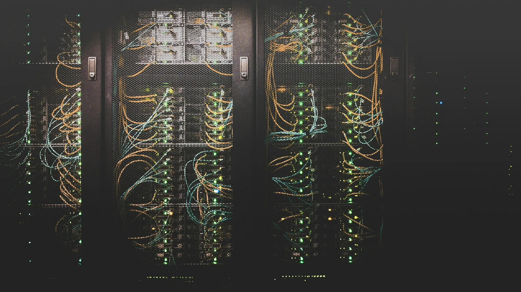 Rows of fiber-connected racks in a data center