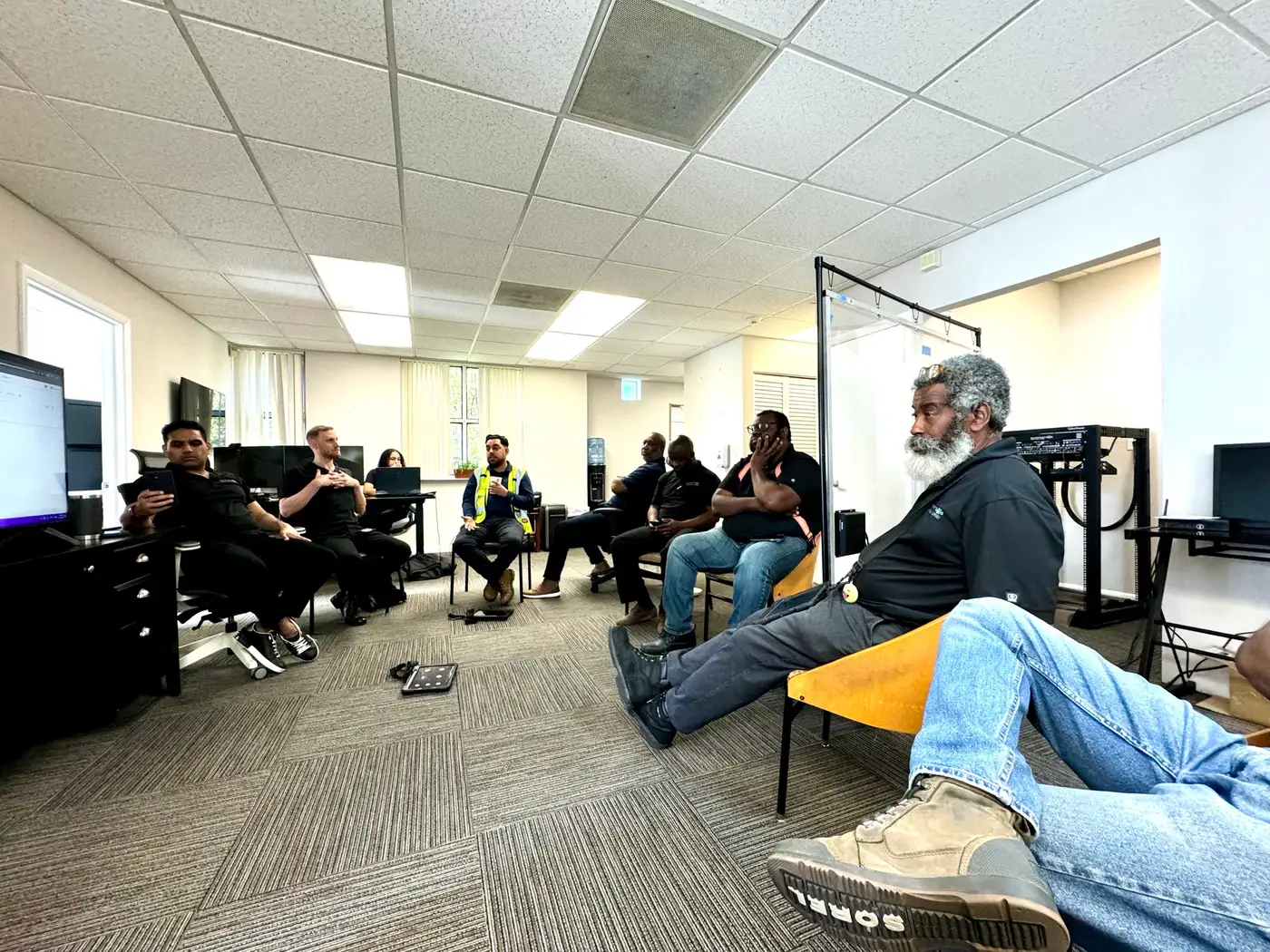 DIST technicians in a team briefing